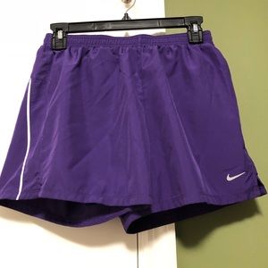 Purple Nike dri fit running shorts